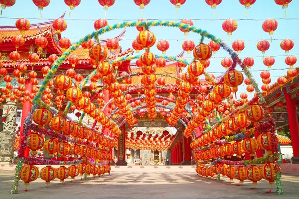 stock image Lunar New Year Hanging Lanterns Tunnel Leading to the Chinese Buddhist Shrine