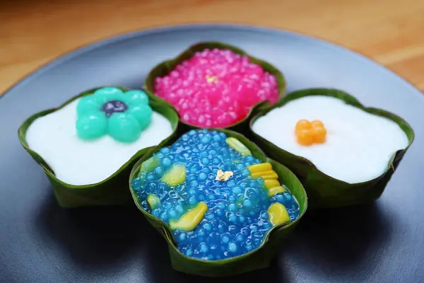 stock image Thai Dessert of Two Layered Coconut Milk Pudding Called Khanom Tako in Both Traditional Version and Upside-down Version