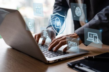 Businessman using smart devices with global network connection and cyber security business data protection technology