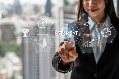 Businesswoman with a modern visual screen global network connection Graph analyzing financial growth and investment data planning concept