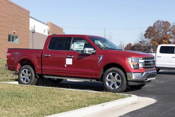 stock image Brownsburg - Circa November 2022: Ford F-150 display at a dealership. The Ford F150 is available in XL, XLT, Lariat, King Ranch, Platinum, and Limited models.