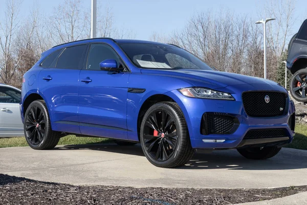 stock image Indianapolis - Circa December 2022: Used Jaguar F-PACE SUV display at a dealership. With supply issues, Jaguar is buying and selling pre-owned cars to meet demand.