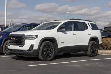 Kokomo - Circa February 2023: GMC Terrain SUV display at a dealership. GMC offers the Terrain in SLE, SLT, AT4 and Denali models.