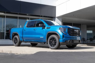 Cincinnati - Circa February 2023: GMC Sierra 1500 pickup display at a dealership. GMC offers the Sierra in HD, HD Pro, AT4 and Denali models.
