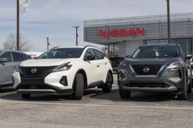 Indianapolis - Circa February 2023: Nissan Car, SUV and Pickup Truck dealership. Nissan manufactures the Sentra, Altima and Versa.