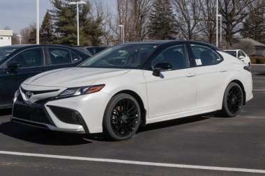 Indianapolis - Circa February 2023: Toyota Camry display at a dealership. Toyota offers the Camry in LE, SE, XLE, XSE and V6 engine models.
