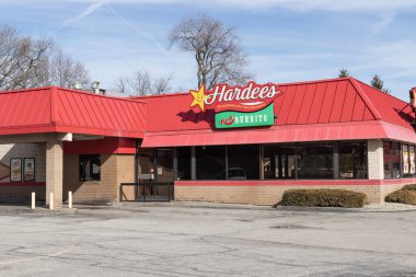 Indianapolis - Circa February 2023: Hardee's fast food restaurant location. Hardee's is operated by CKE and the sister restaurant of Carl's Jr.