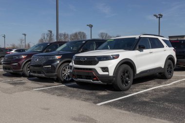 Fishers - Circa February 2023: Ford Explorer display at a dealership. Ford offers the Explorer in a base model, XLT, Limited, ST, King Ranch and Platinum version.