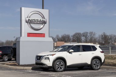 Fishers - Circa February 2023: Nissan Rogue display at a dealership. Nissan offers the Rogue in S, SV, SL and Premium models.