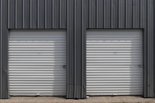 Stock image Self storage and mini storage garage units. Personal warehouse lockers provide safe and secure storage options.