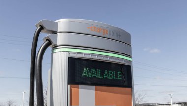 Avon - Circa April 2023: ChargePoint EV Charging Station. ChargePoint plug-in vehicle stations are in business parking lots or home use. clipart