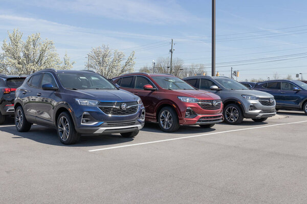 Carmel - Circa April 2023: Buick Encore SUV display. Buick offers the Encore with Amazon Alexa, Apple CarPlay and Android Auto built in.