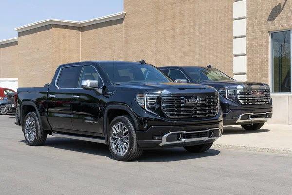 stock image Carmel - June 10, 2023: GMC Sierra 1500 pickup display at a dealership. GMC offers the Sierra in HD, HD Pro, AT4 and Denali models.