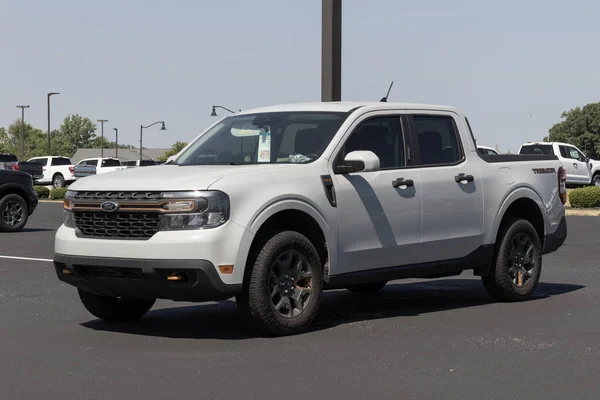 stock image Brownsburg - June 24, 2023: Ford Maverick compact truck display at a dealership. Ford offers the Maverick in XL, XLT and Lariat models.