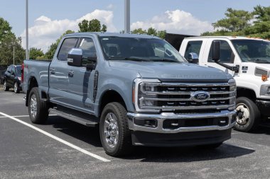 Kokomo - July 30, 2023: Ford F-250 Super Duty Crew Cab display at a dealership. Ford offers the F250 in utility service models. clipart