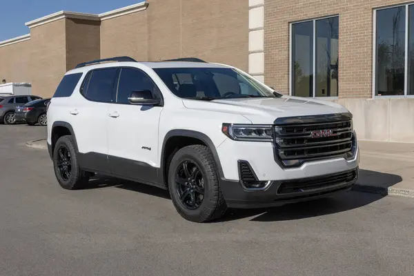 stock image Carmel - November 2, 2023: GMC Acadia SUV display at a dealership. GMC offers the Acadia in SLE, SLT, AT4 and Denali models.