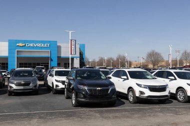 Noblesville - February 3, 2024: Chevrolet car, truck and SUV dealership. Chevy offers models such as the Silverado, Equinox, Trax, Trailblazer and Bolt EV. clipart