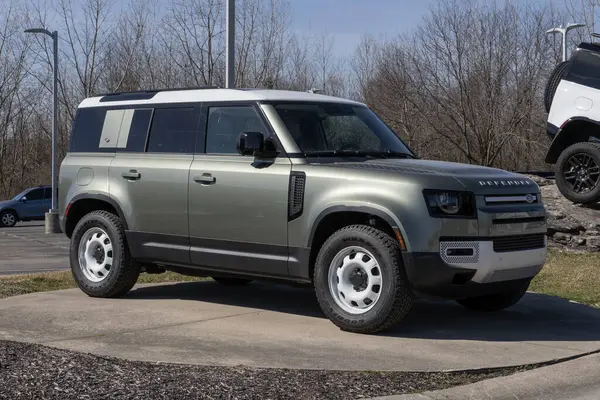 Stock image Indianapolis - February 3, 2024: Land Rover Defender 110 S display at a dealership. Land Rover offers the Defender in 90, 110 and 130 models. MY:2024