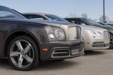 Indianapolis - March 16, 2024: Bentley Luxury car and SUV display at a dealership. Bentley Motors is a British manufacturer of luxury cars and SUVs. clipart