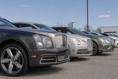 Indianapolis - March 16, 2024: Bentley Luxury car and SUV display at a dealership. Bentley Motors is a British manufacturer of luxury cars and SUVs. clipart