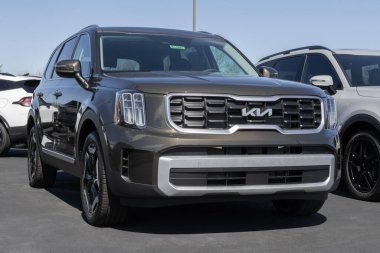 Indianapolis - March 16, 2024: Kia Telluride S display at a dealership. Kia also offers the Telluride in X-Line, LX, S, and EX models. MY:2024 clipart