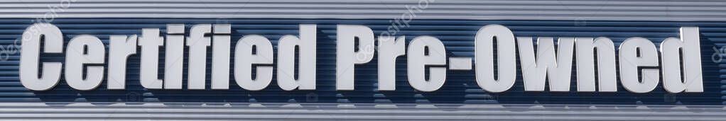 Certified Pre-Owned vehicle banner at a used car dealership for internet or website. Used cars are in high demand.