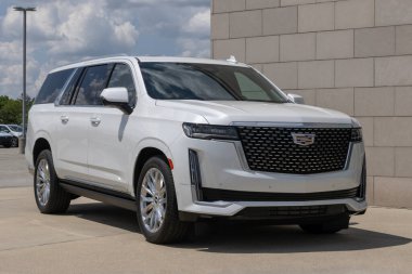 Fishers - May 19, 2024: Cadillac Escalade ESV 4WD Premium Luxury display. Cadillac offers the Escalade in Luxury, Sport, Platinum models. MY:2023