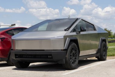 Indianapolis - May 19, 2024: Tesla Cybertruck display at a dealership. Tesla claims the Cybertruck has a driving range of up to 340 miles. MY:2024