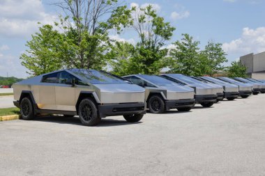 Indianapolis - May 19, 2024: Tesla Cybertruck display at a dealership. Tesla claims the Cybertruck has a driving range of up to 340 miles. MY:2024