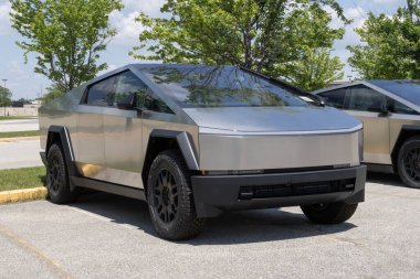 Indianapolis - May 19, 2024: Tesla Cybertruck display at a dealership. Tesla claims the Cybertruck has a driving range of up to 340 miles. MY:2024