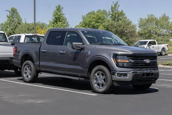 stock image Zionsville - May 30, 2024: Ford F-150 XLT display at a dealership. The Ford F150 is available in XLT, Lariat, King Ranch, and Limited models. MY:2024