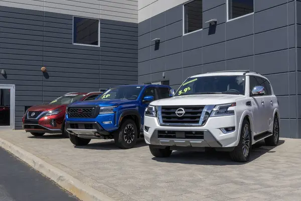stock image Indianapolis - May 30, 2024: Nissan Armada, Frontier and Murano display at a dealership. Nissan offers gas, electric and hybrid powered vehicles. MY:2024