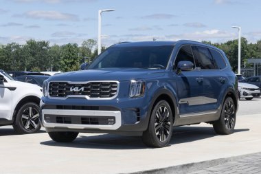 Indianapolis - June 30, 2024: Kia Telluride SX-Prestige display. Kia offers the Telluride with a 3.8L Direct Fuel Injected V6 engine. MY:2024 clipart