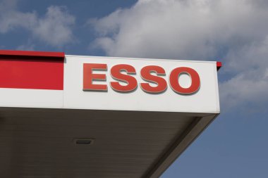 Windsor, ONT - July, 12 2024: Esso brand gasoline, petrol and convenience station. The Esso name is used by Imperial Oil, majority owned by ExxonMobil. clipart