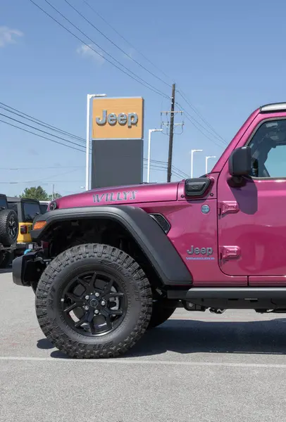 stock image Lafayette - August 10, 2024: Jeep Wrangler Willys 4xe display. Jeep offers the Wrangler 4xe with a 2.0L Turbocharged 4-Cylinder PHEV engine. MY:2024