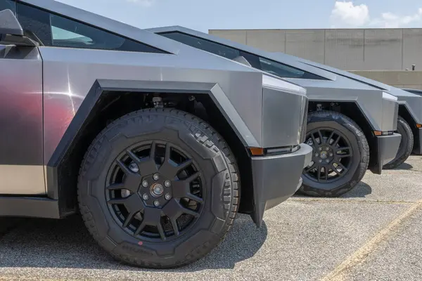 stock image Indianapolis - August 25, 2024: Tesla Cybertruck display at a dealership. Tesla offers the Cybertruck with driving range of up to 340 miles.