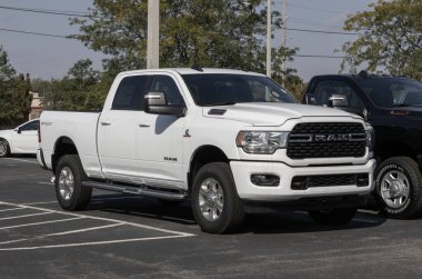 Noblesville - October 6, 2024: Ram 2500 Big Horn Crew Cab 4X4 Pickup display. Ram offers the 2500 with a 6.7L Cummins Turbo Diesel engine. MY:2024 clipart