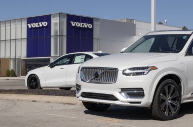 Indianapolis - October 20, 2024: Volvo XC90 T8 and S60 Recharge AWD display at a dealership. Volvo offers gas, EV, Hybrids and Plug-In Hybrid vehicles. clipart