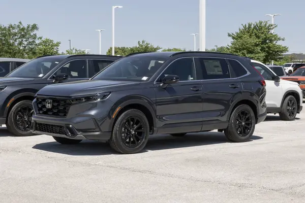 Avon - 18 Mayıs 2025: Honda CR-V Hybrid AWD Spor Sergisi. Honda, CRV 'ye 2.0L Doğrudan Enjekte edilmiş 4 silindirli hibrit motor sunar. MY:2025