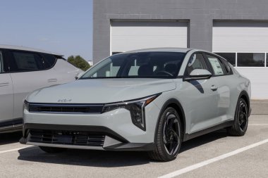 Fishers - September 28, 2025: Kia K4 EX compact sedan display at a dealership. Kia offers the K4 with a 2.0L MPI 4-Cylinder engine. MY:2025