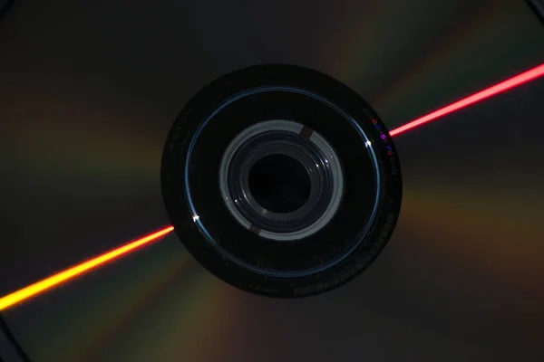 Cdディスクの表面を閉じます ミュート色の光 パレットの抽象的なデザイン — ストック写真
