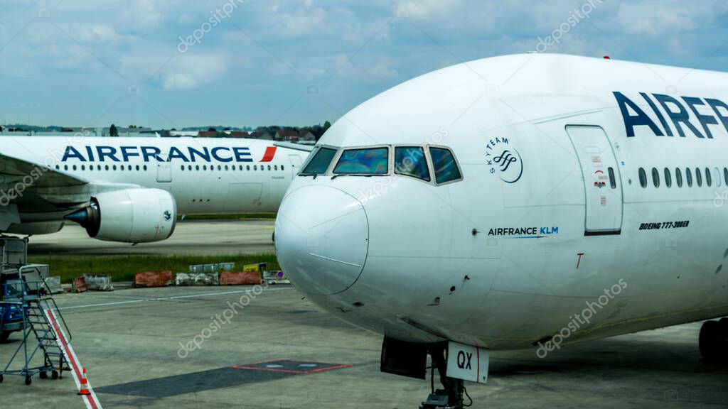 13JUN2024, CHARLES DE GAULLE Airport, Paris, France - Two Air France aircrafts parked on the tarmac for ground maintenance