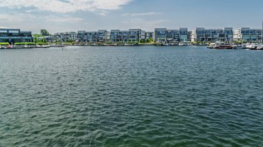 05AUG2024, Friday Harbour,Ontario, Canada - View of the marina and luxury houses on the waterfront clipart