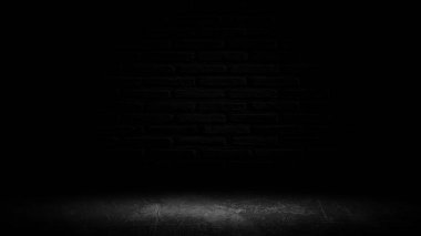 Sahne ışıkları olan bir ürün gösterisi. Siyah stüdyo arka planı. Ürün gösterimi için montaj olarak kullan