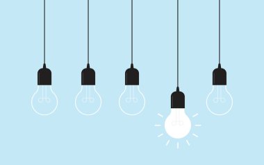 Mavi arka planda parlayan ampuller asıyorum. Fikir kavramı