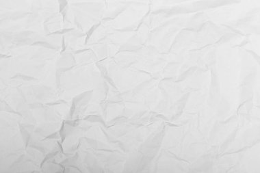 Beyaz buruşmuş kağıt doku arka planı. Arkaplan olarak beyaz geri dönüştürülmüş kağıt dokusu. 