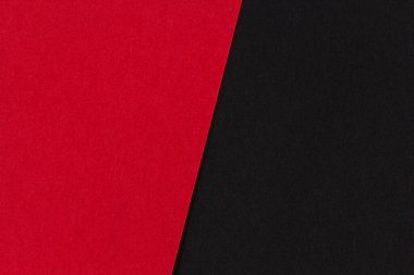 Kırmızı ve siyah kağıt dokularının çapraz bileşimi, modern ve minimalist arkaplanlar için kalın kontrast tasarımı.