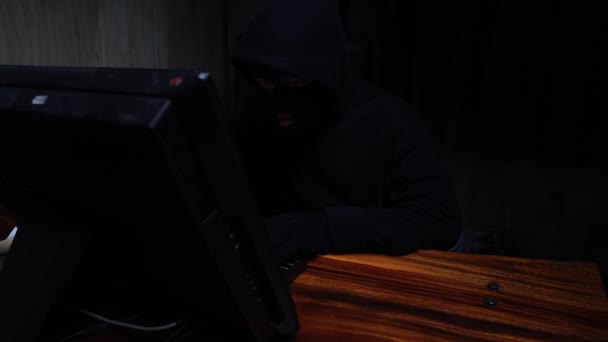 Dangerous Hooded Hacker Breaks Government Data Server — Stock Video