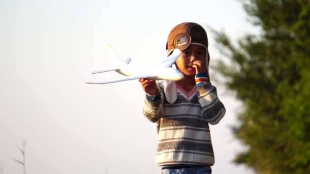 Happy Asian Child Playing Foam Airplane Park — Stock Video