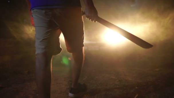 Man Walking Night Holding Weapon — Videoclip de stoc